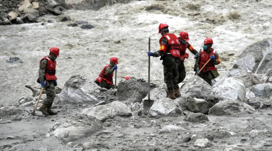 Families comb Nepal hospitals for tourists missing in flood